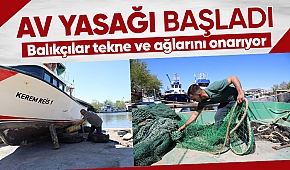 Balıkçılar ağ ve teknelerini onarıyor
